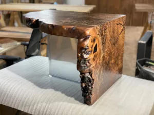 Claro Walnut Burl Coffee Table with a Resin Leg